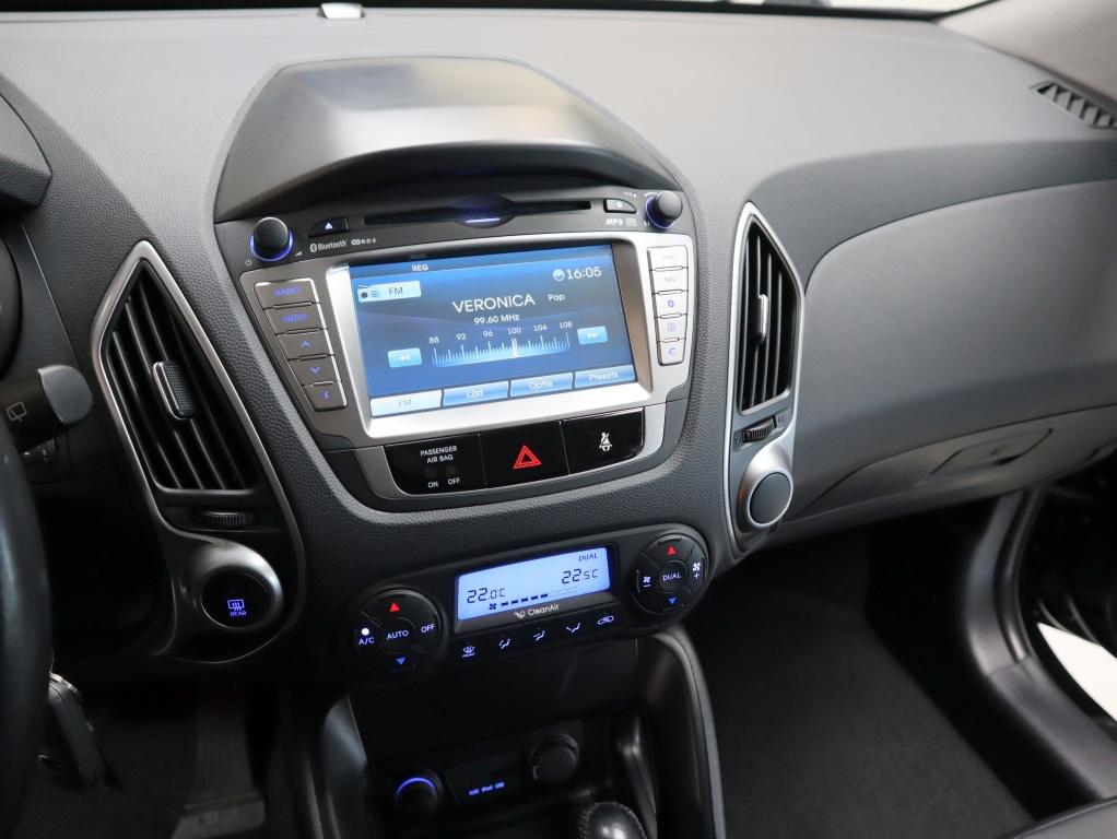 Hyundai ix35 2.0i Bus.Ed. | cruise | cam | clima | trekhaak, Gebruikt, Zwart, 4 cilinders, Leder en Stof