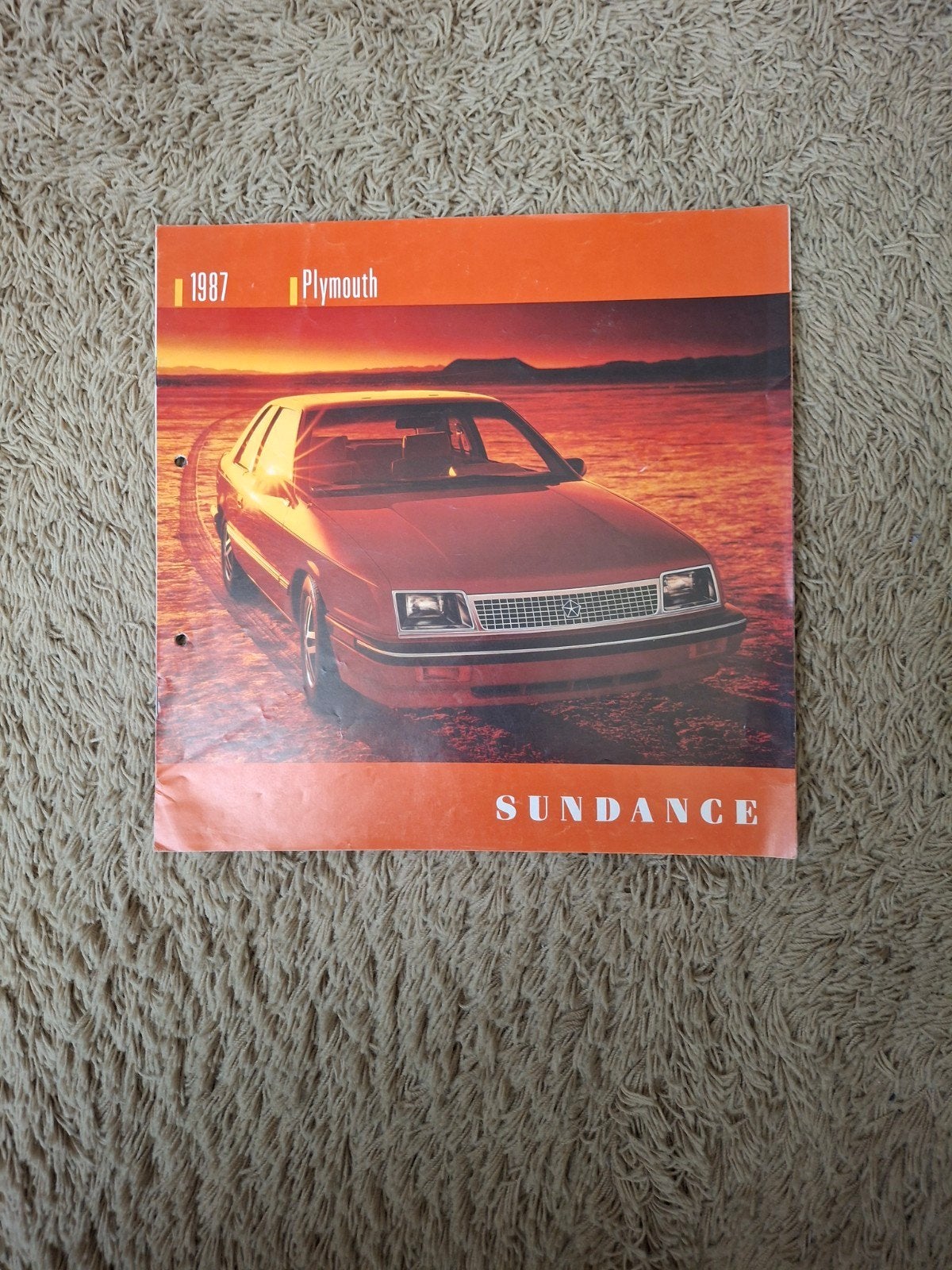 autofolder Plymouth Sundance 1987, Verzenden, Gelezen