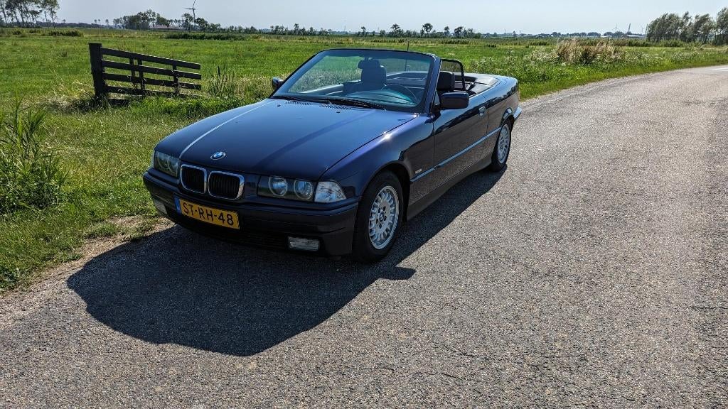 BMW 3-Serie E36 318i Cabriolet 1998 Nieuwe APK, Auto's, BMW, 1345 kg, Achterwielaandrijving, Zwart, 4 cilinders