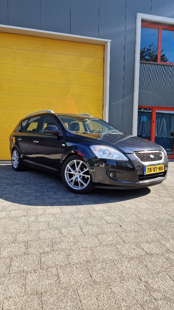 Kia (Pro) Cee d 1.6 Cvvt Sporty Wagon 2007 Zwart, Auto's, Voorwielaandrijving, 1591 cc, 4 cilinders, Sound system