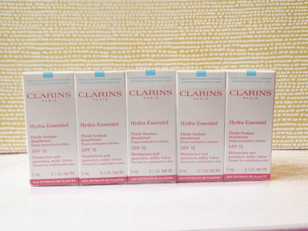 Clarins Hydra-Essentiel Milky Lotion SPF15 50ml (10 proefjes, Ophalen of Verzenden, Nieuw, Gehele gezicht, Verzorging