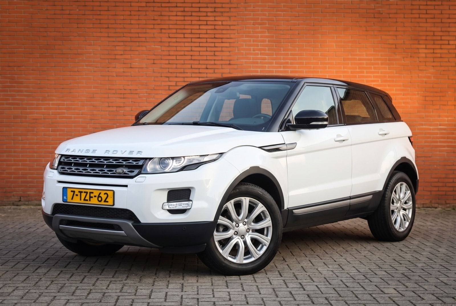 Range Rover Evoque 2.0 SI4 4WD AUT PANO, Auto's, Euro 5, 1800 kg, Zwart, 4 cilinders