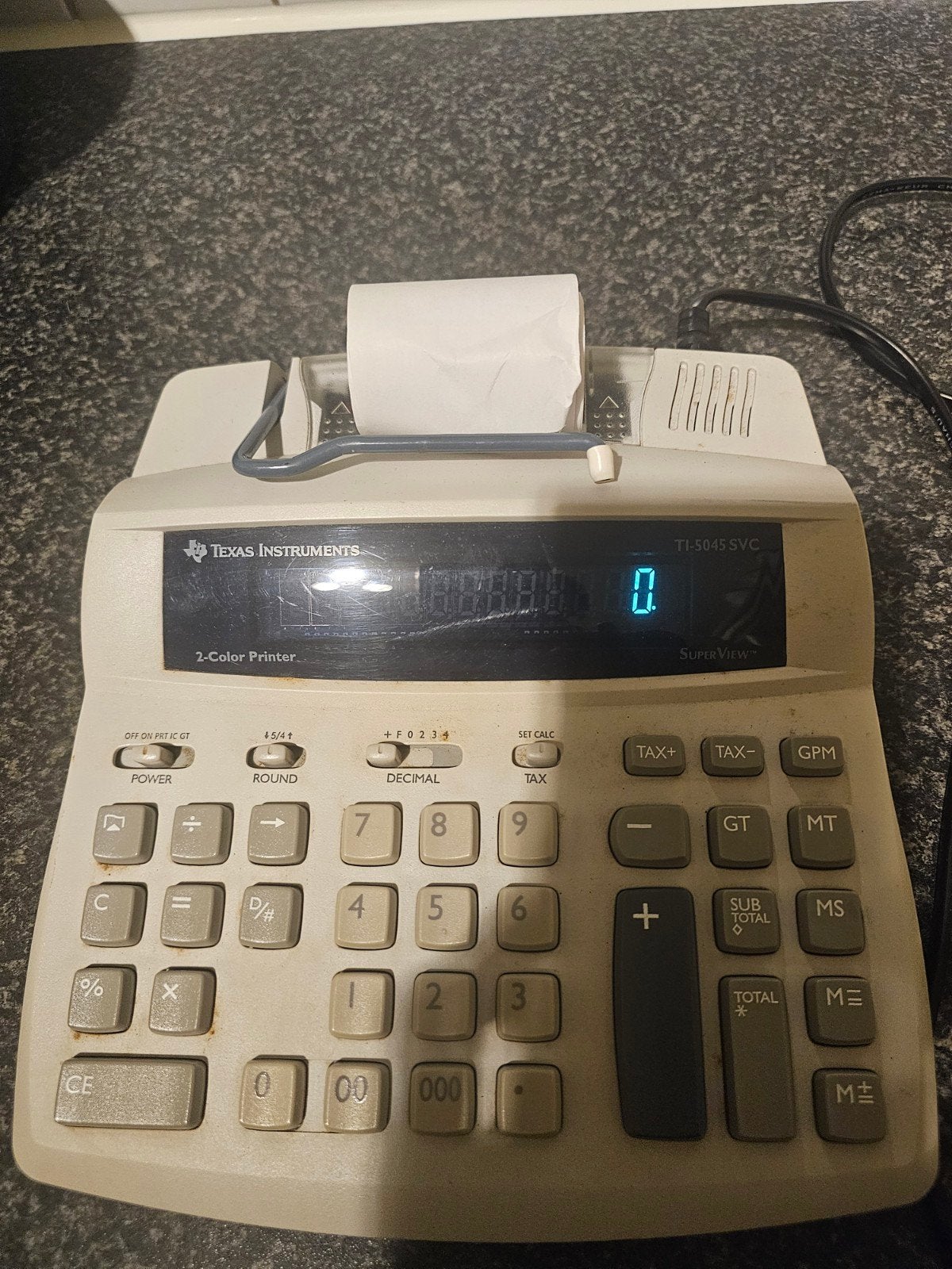 Rekenmachine met telrol Texas Instruments, Ophalen