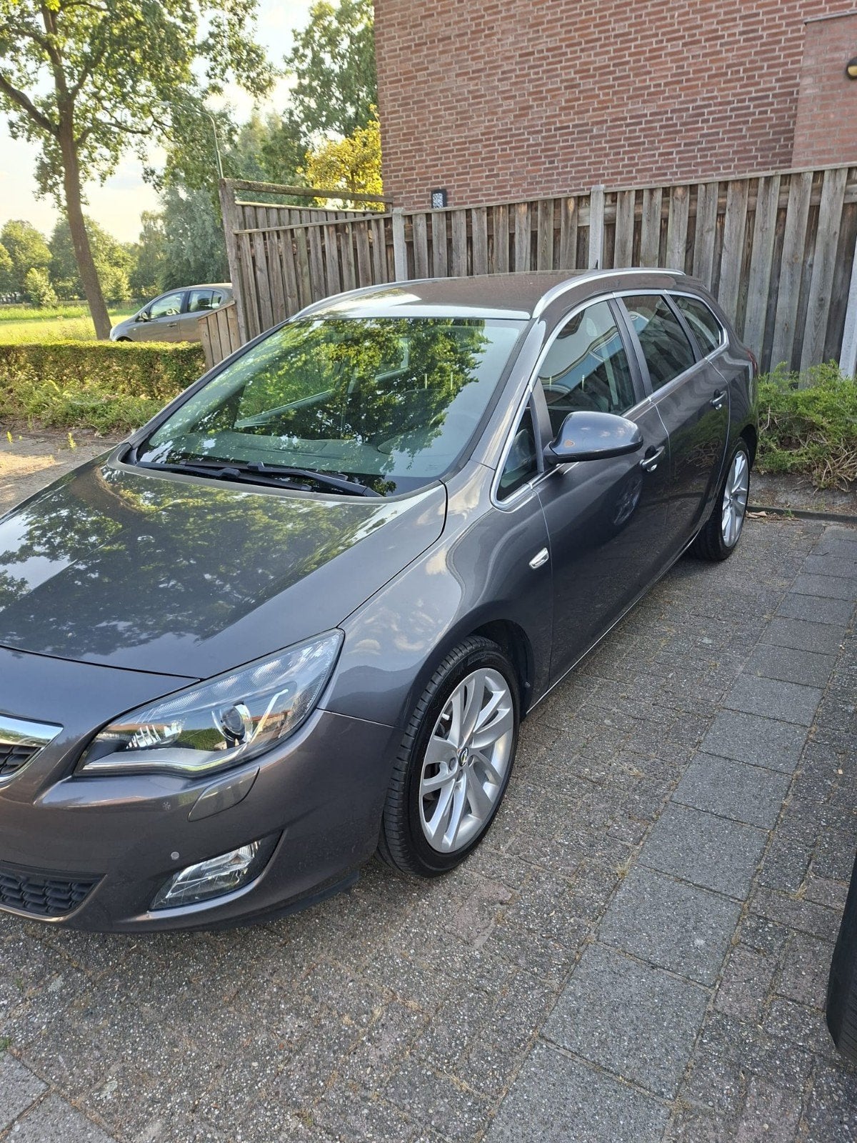 Opel Astra 1.4 Turbo 88KW ST 2011 Grijs, Voorwielaandrijving, Zwart, 4 cilinders, 1337 kg