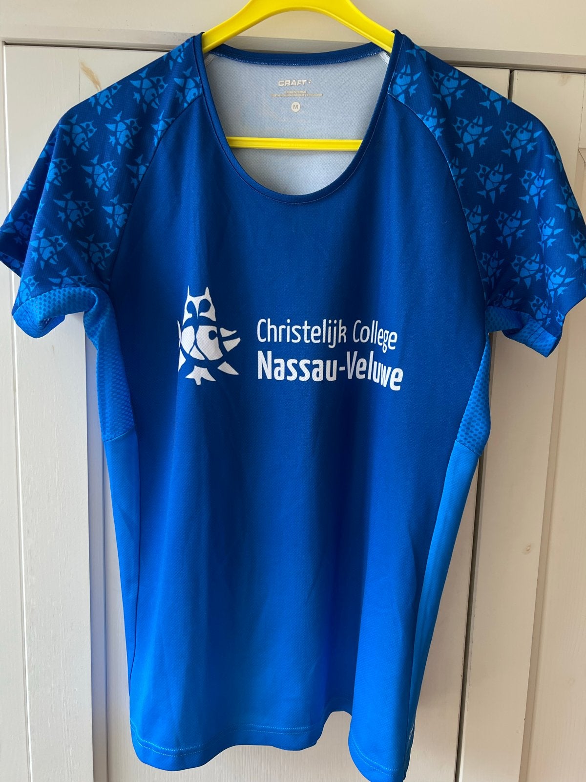 Nieuw Craft sportshirt M Christelijk College Nassau-Veluwe, Maat 38/40 (M), Blauw, Overige typen, Nieuw