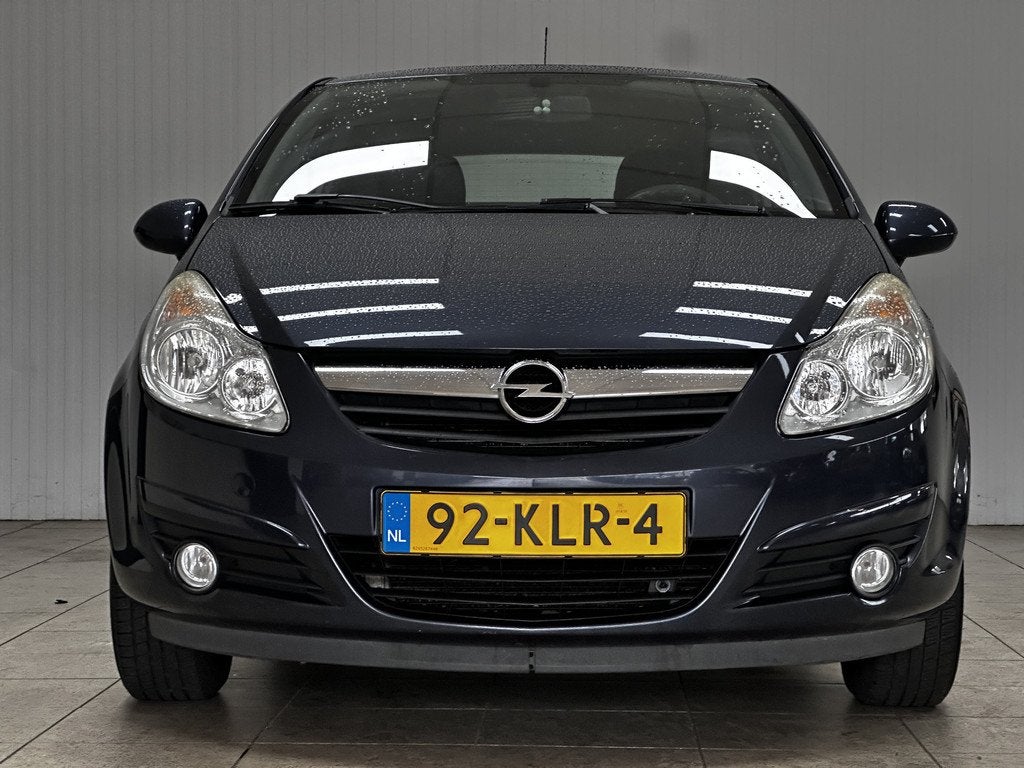 Opel Corsa 1.4-16V Enjoy/ Airco!/ Cruise/ Multi.Stuur/ Radio, Voorwielaandrijving, Stof, Gebruikt, Zwart