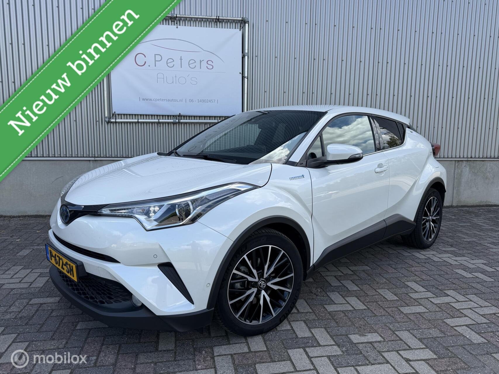 Toyota C-HR 1.8 Hybrid Dynamic 2018 / Camera / Leder / Keyle, Auto's, Dealer onderhouden, Euro 6, 4 cilinders, Leder