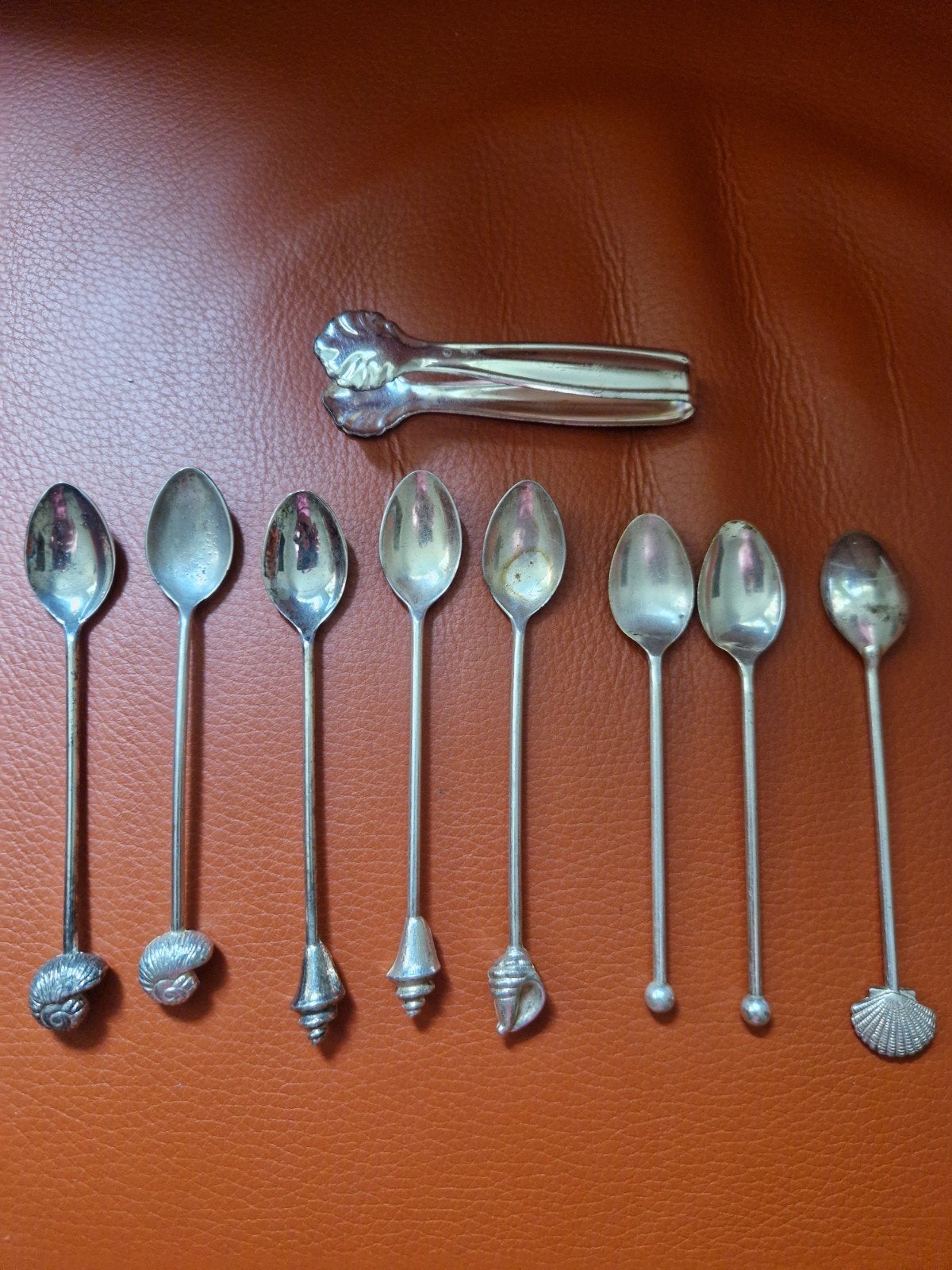8 theelepeltjes met schelp en suikertang, Ophalen of Verzenden, Nieuw, Overige materialen, Oor- of Traguspiercing