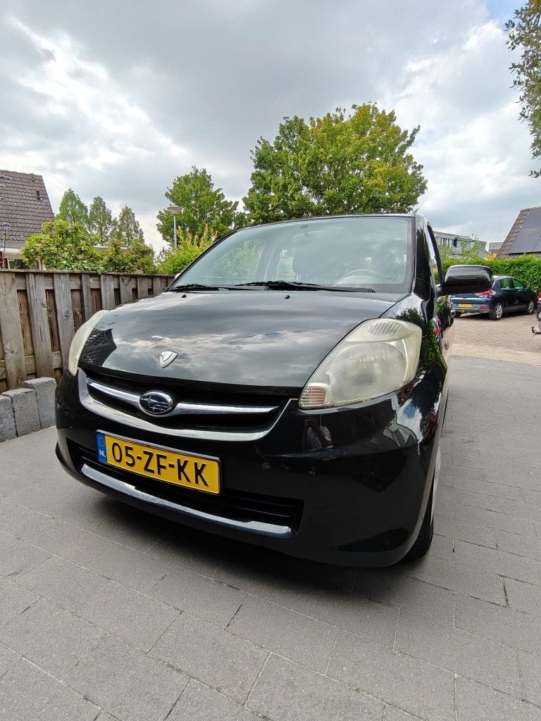 Subaru Justy 1.0 2008 Zwart 5-Deurs - APK tot 06-02-2027, Voorwielaandrijving, Justy, Stof, Zwart