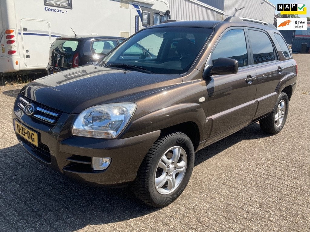 Kia Sportage 2.0 CVVT Comfort, leder, stoelverwarming, trekh, Auto's, Kia, 1442 kg, Gebruikt, 4 cilinders, Handgeschakeld