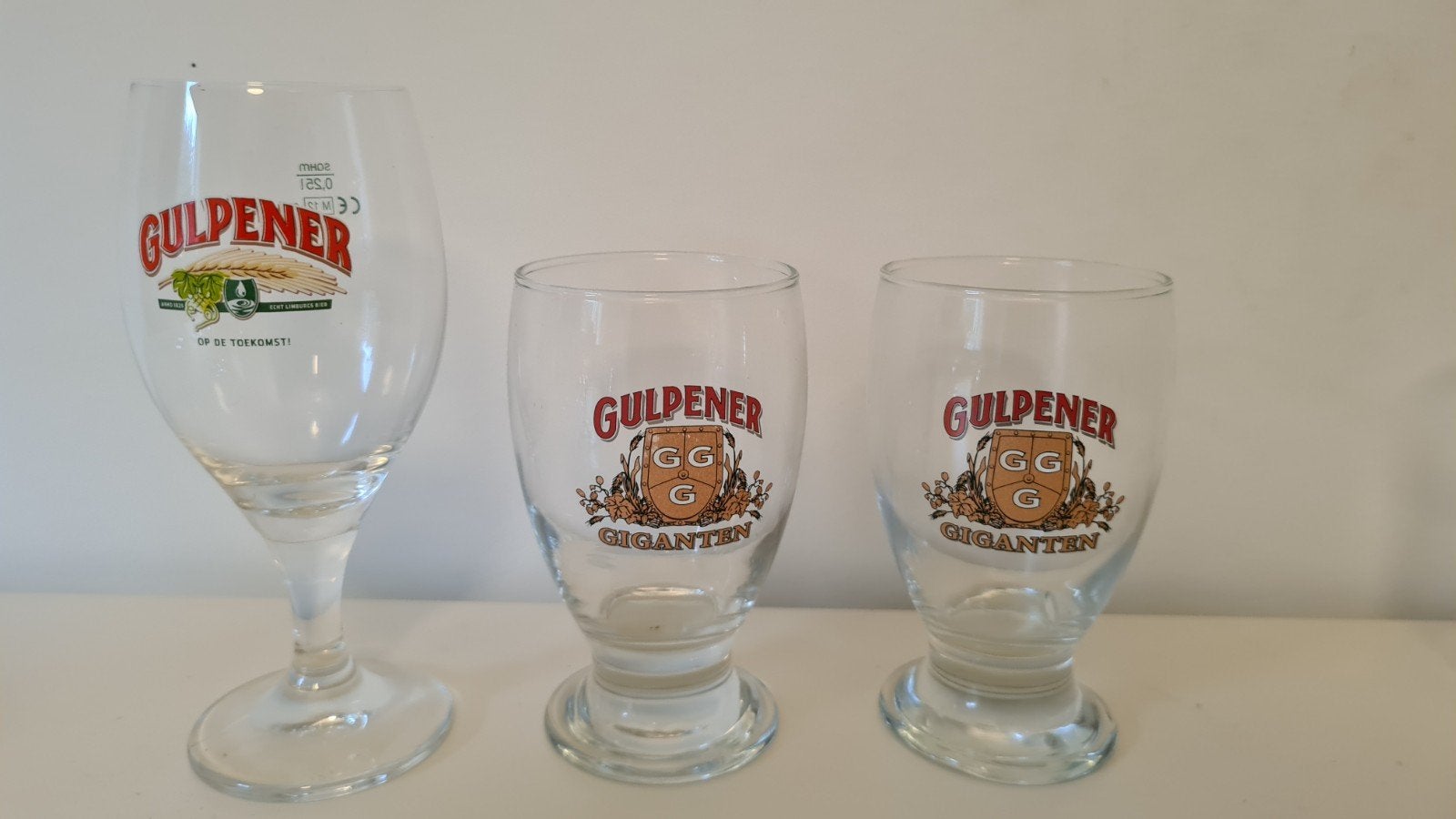 Gulpener bierglazen - set van 3, Ophalen of Verzenden, Gebruikt