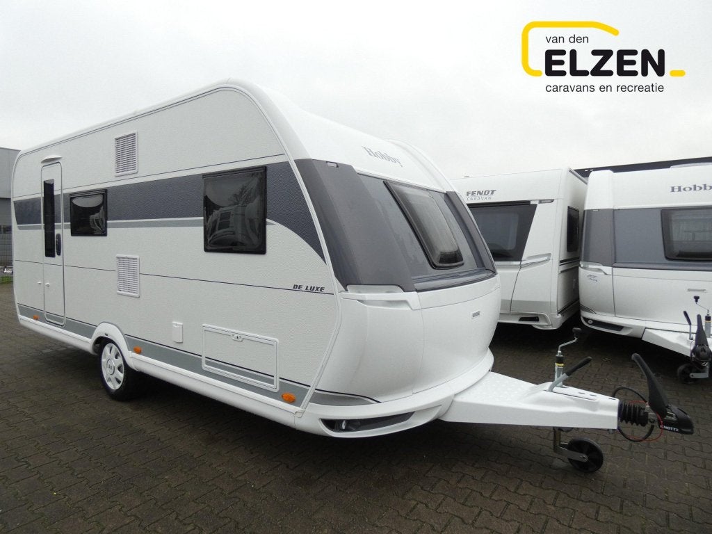Hobby De Luxe 490 KMF actie prijs, incl. opties, Caravans en Kamperen, Caravans, Dwarsbed, Hobby, Bedrijf, Treinzit