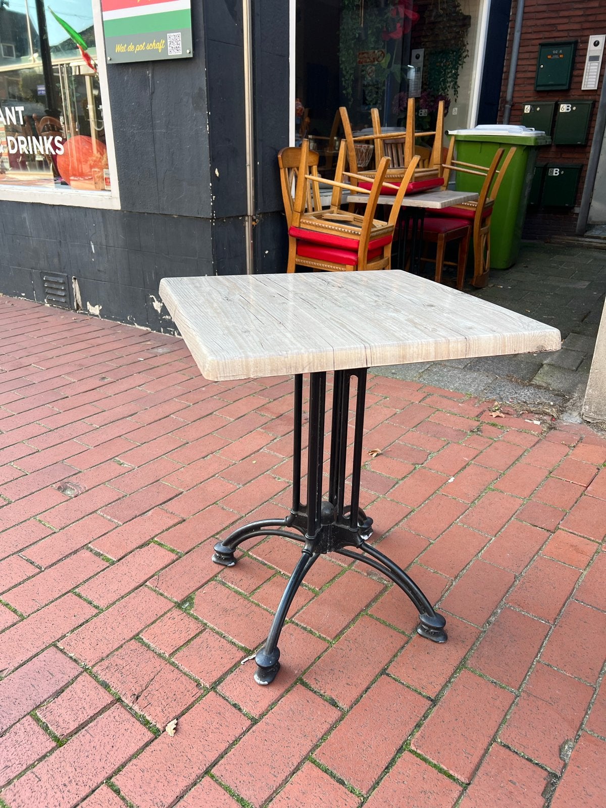 16X Terrastafels met houtlook blad en gietijzeren onderstel, Ophalen, Gebruikt, Vierkant, Metaal