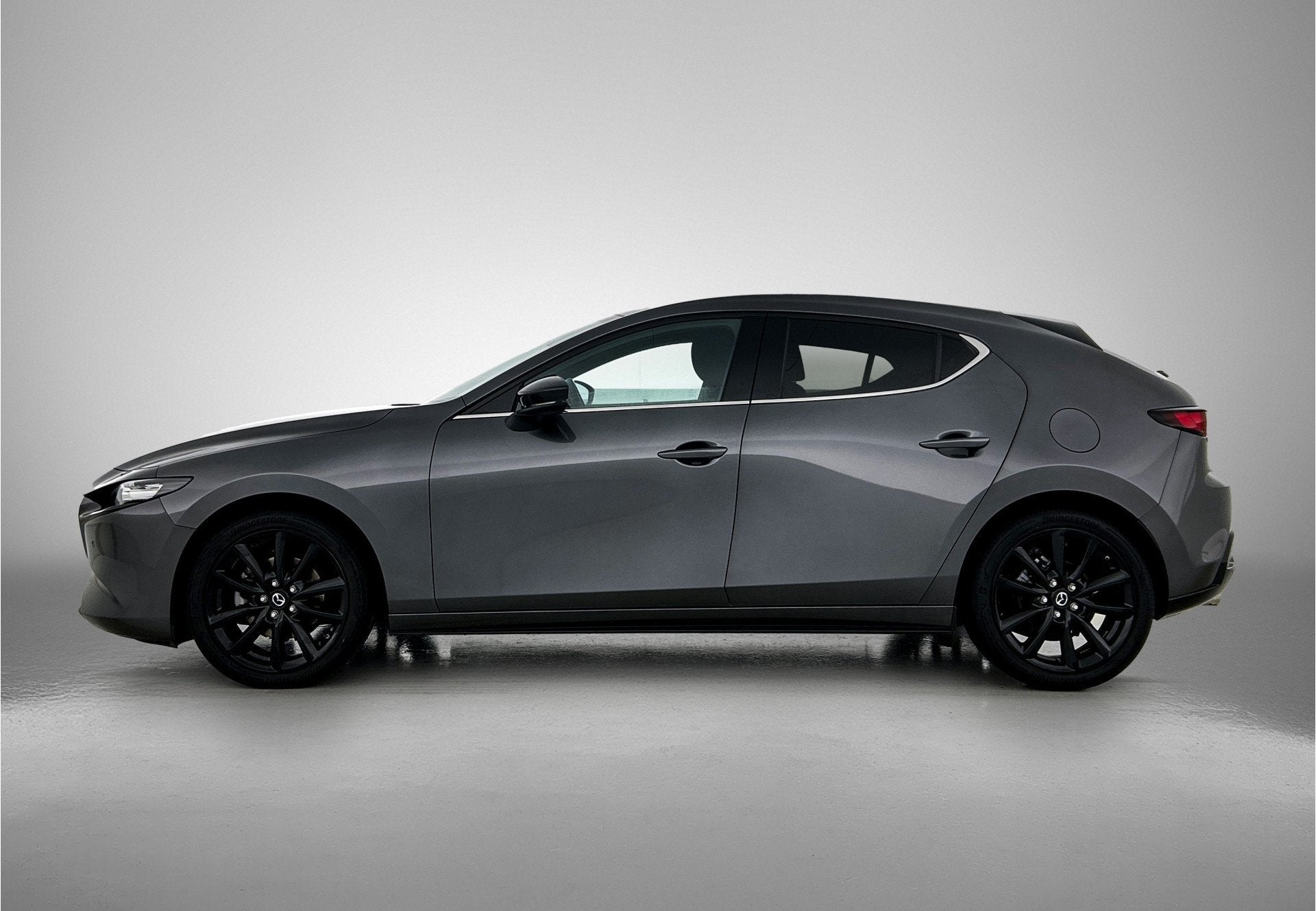 Mazda 3 2.0 e-SkyActiv-G M Hybrid 122 Homura automaat | RIJK, 12 maanden, Stof, Gebruikt, 4 cilinders