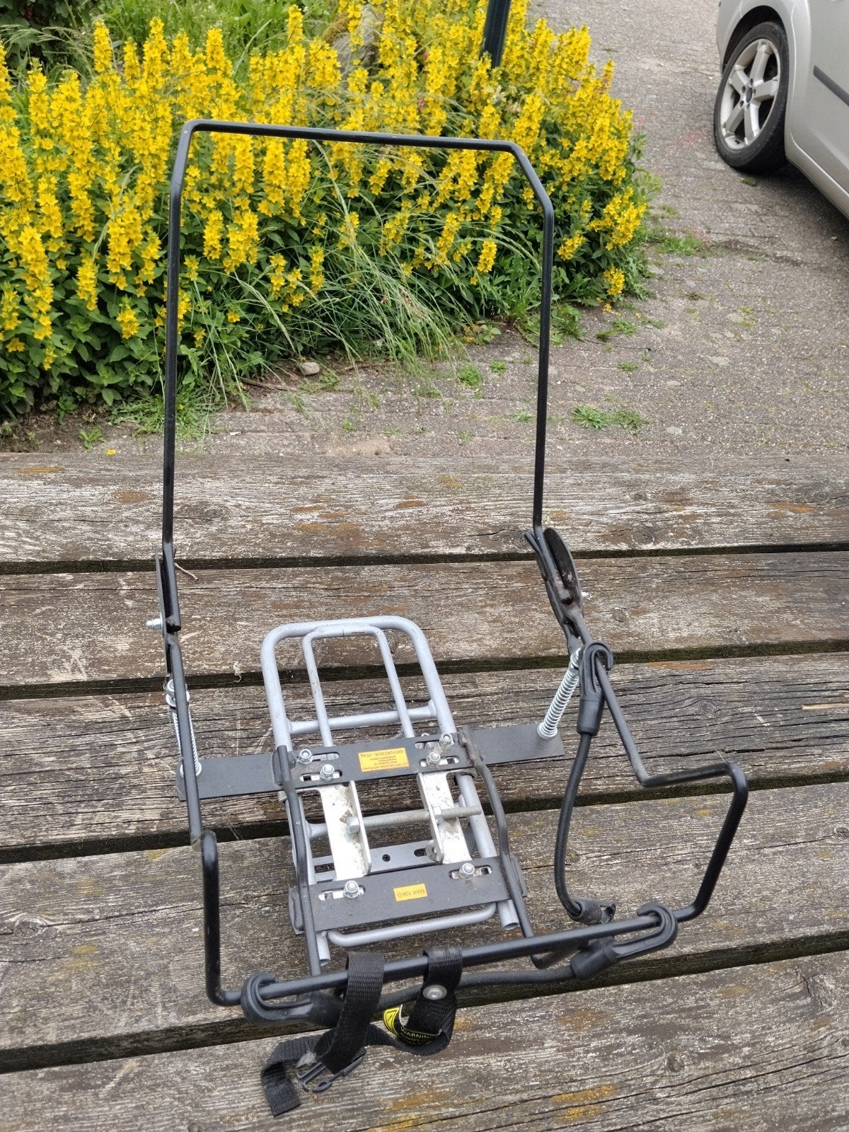 T.e.a.b. Maxicosi draagbeugel voor bakfiets of bagagedrager, Ophalen