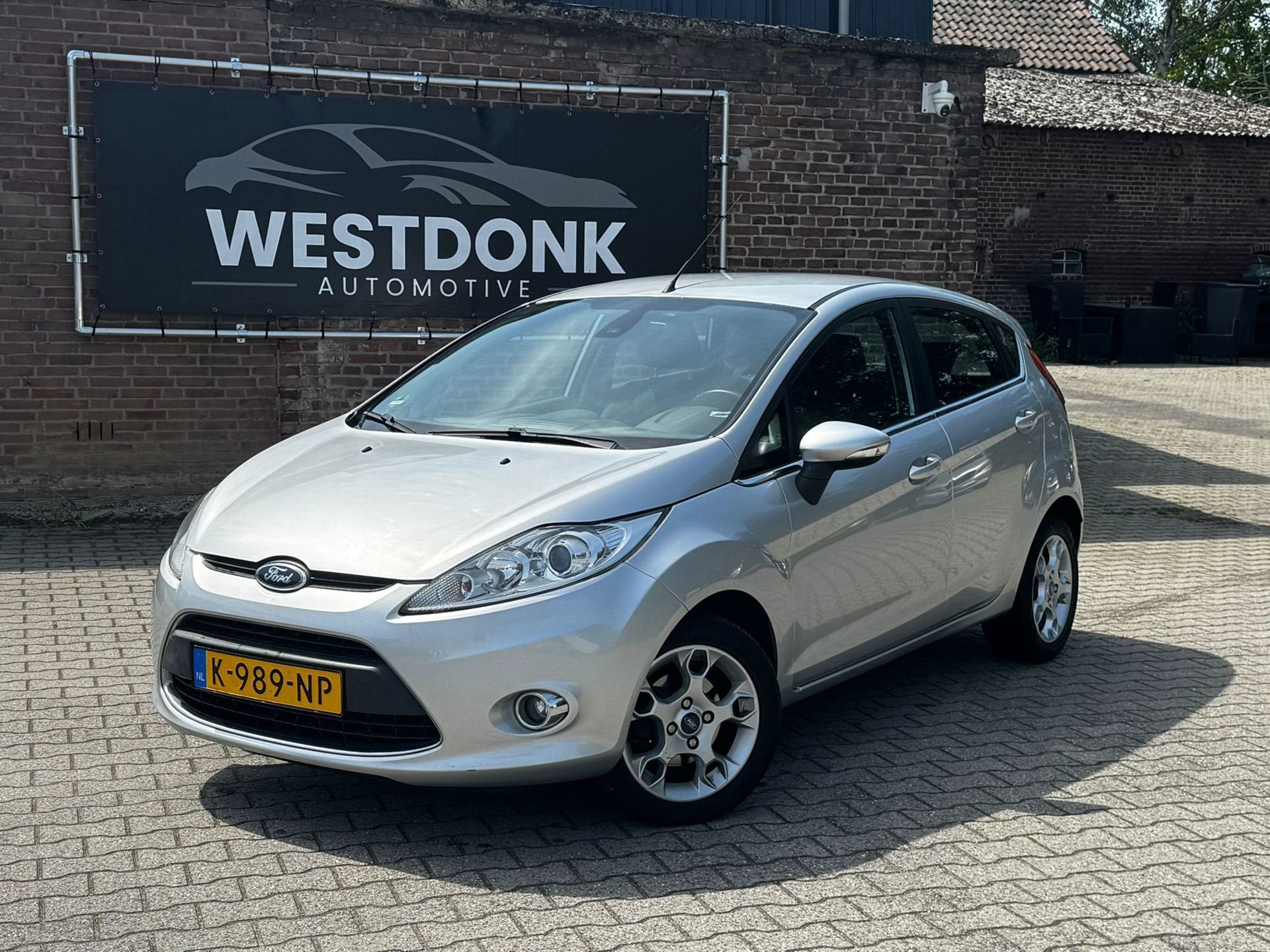 Ford Fiesta 1.25 Titanium 5drs - Airco/Climate/Stoelverwarmi, Voorwielaandrijving, Euro 5, 1242 cc, 82 pk
