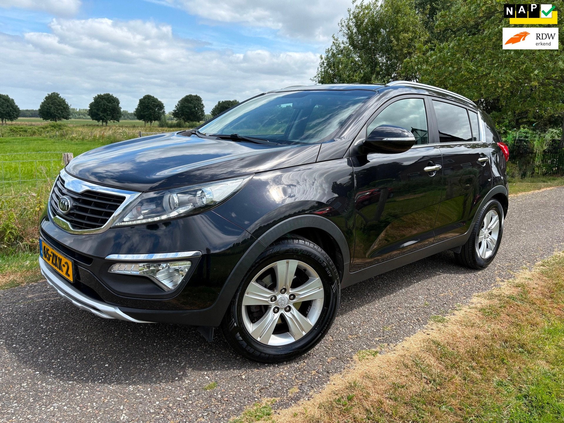 Kia Sportage 1.6 GDI Plus Pack|Trekhaak|Cruise|APK, Voorwielaandrijving, Euro 5, 4 cilinders, Zwart