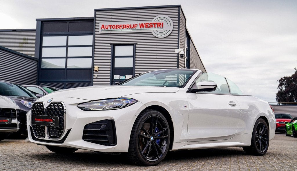 BMW 4-serie Cabrio M440i xDrive High Executive | Laser LED |, Auto's, BMW, Automaat, 4-Serie, 4 stoelen, Wit