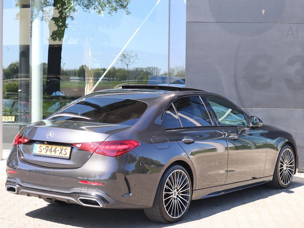 Mercedes-Benz C-klasse 200 Launch Edition AMG Line, Auto's, 4 cilinders, Origineel Nederlands, Bedrijf, 204 pk