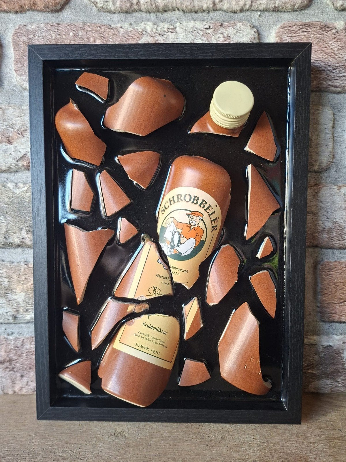 Schrobbelèr fles verwerkt in een lijst (23x33) met Epoxy, Ophalen of Verzenden