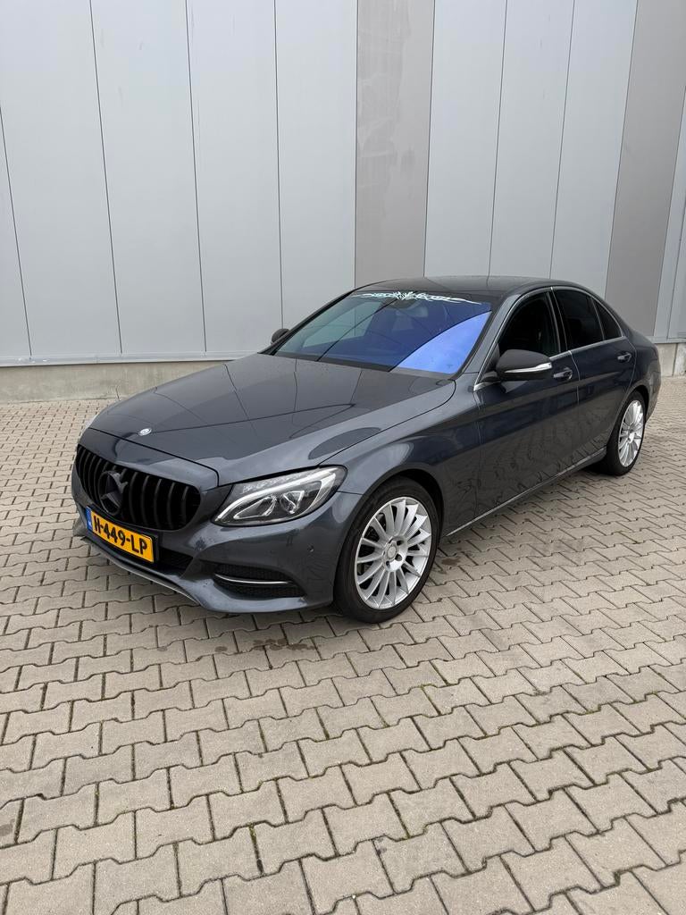 Mercedes-Benz C-Klasse C180 1.6 115KW Aut7 2015 Zwart, Automaat, 1800 kg, Zwart, 1595 cc