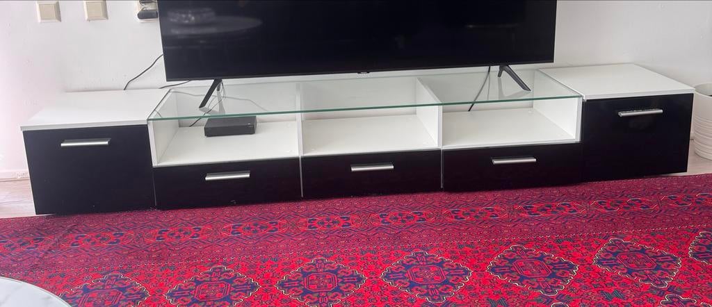 Modern TV-meubel zwart/wit met glazen blad, Ophalen, Kunststof, Gebruikt, 200 cm of meer