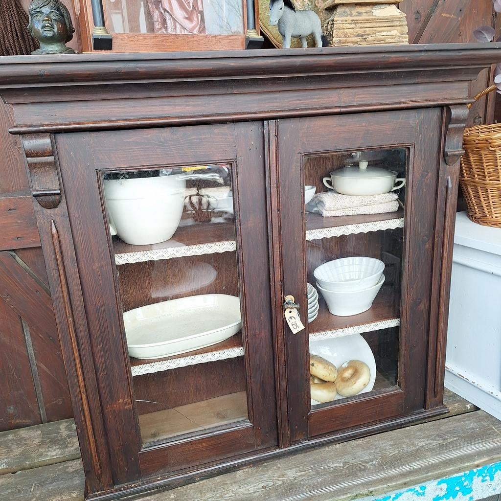 Hang vitrinekast met glazen deuren, Ophalen