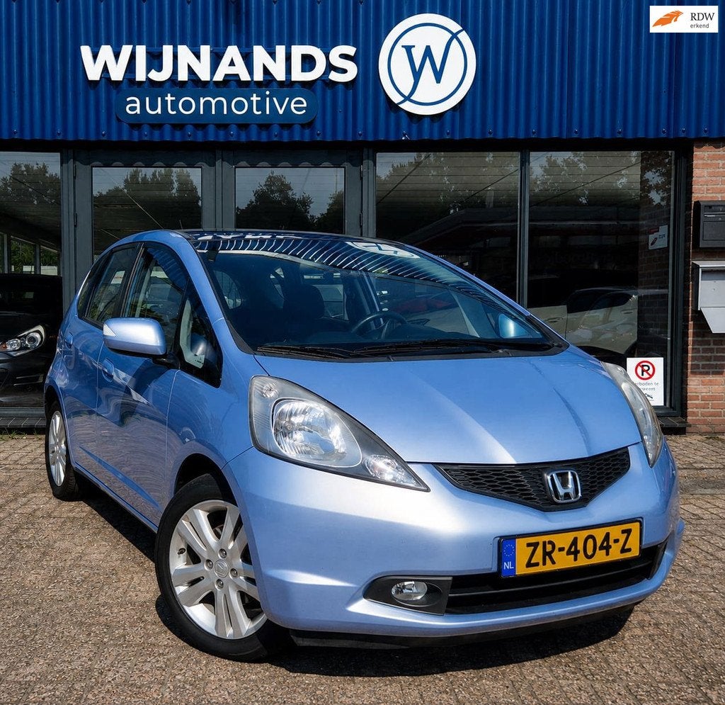 Honda Jazz 1.4 Exclusive Automaat Clima Stoelvw Cruise Bluet, Auto's, Honda, Euro 5, 450 kg, 40 €/maand, 4 cilinders