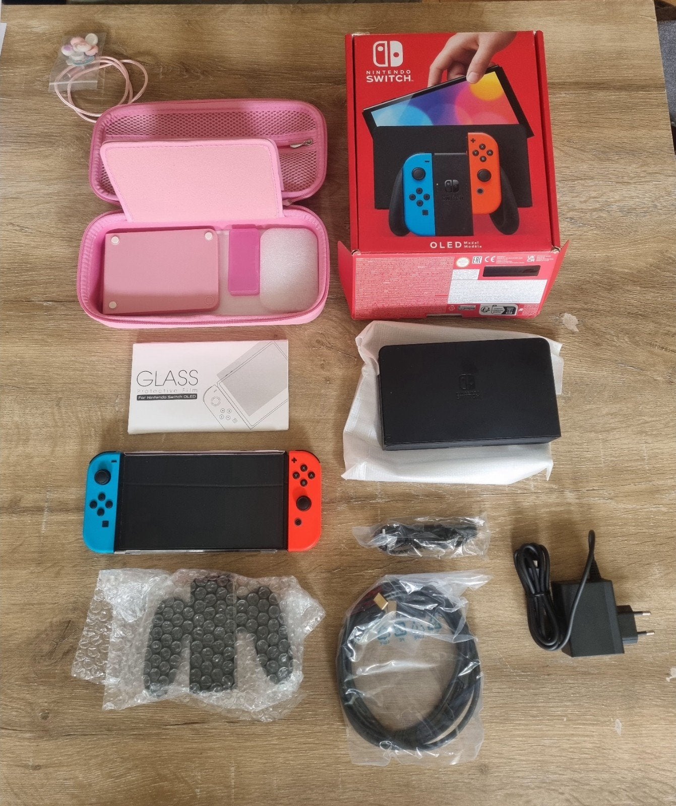 Nintendo Switch OLED Rood/Blauw (met verificatierapport), Ophalen of Verzenden, Zo goed als nieuw, Met 2 controllers, Switch OLED