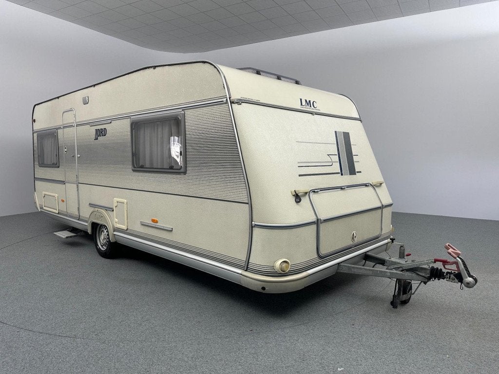 LMC Lord Ambassador 560 Queensbed Voortent Fietsendrager, Caravans en Kamperen, Vast bed, Rondzit, 5 tot 6 meter, LMC en Münsterland