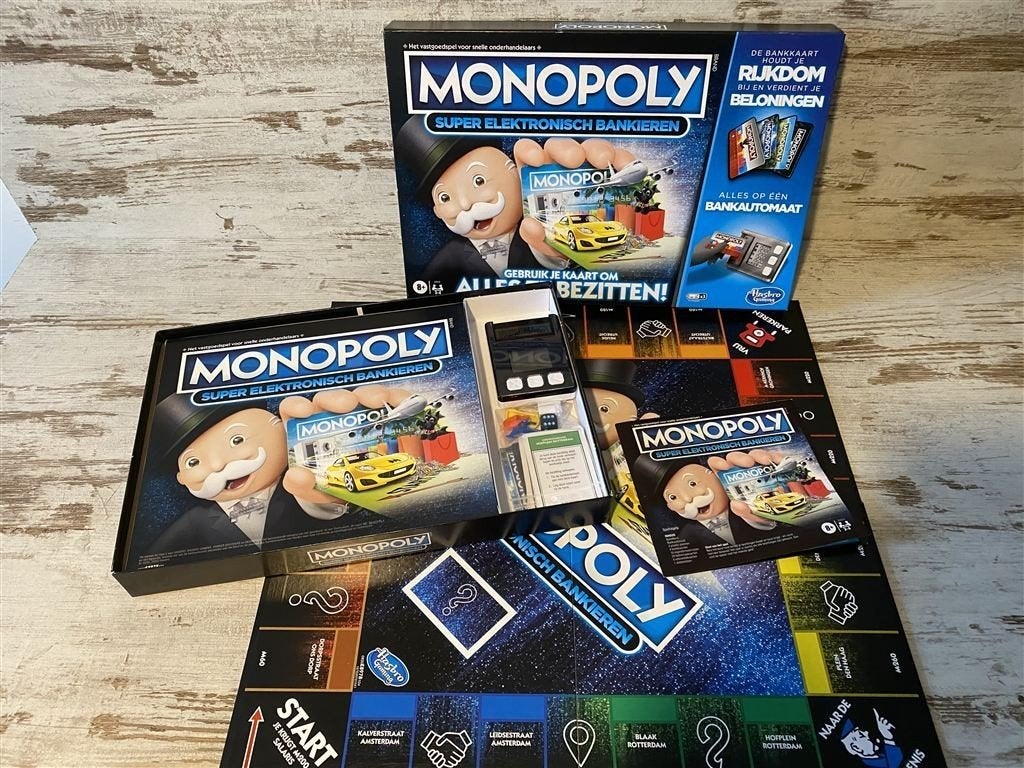 Monopoly super elektronisch bankieren [s648], Hobby en Vrije tijd, Verzenden, Zo goed als nieuw
