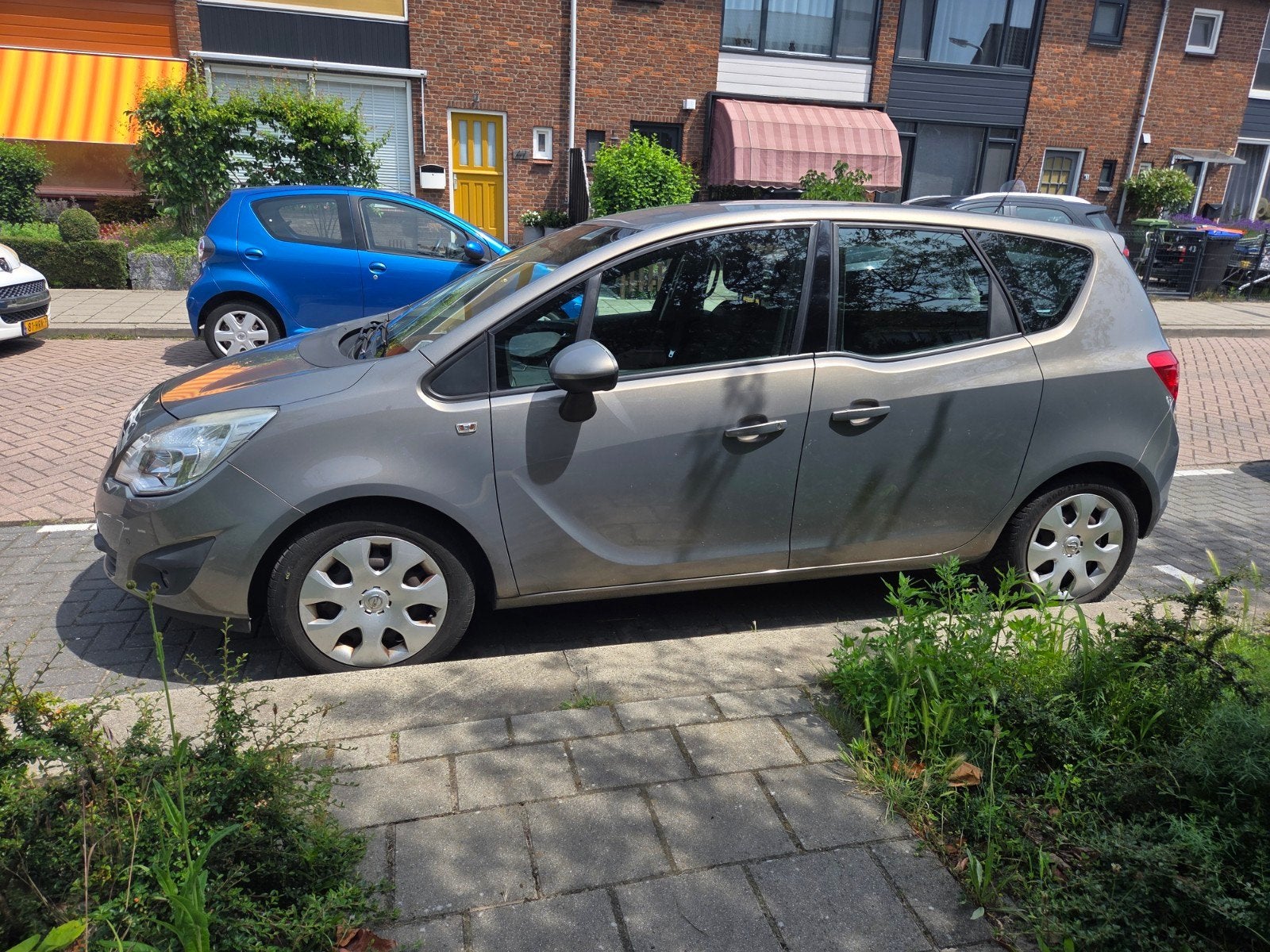 Opel Meriva 1.4 74KW 2011 Bruin, Auto's, Opel, Particulier, Meriva, Airbags, Airconditioning, Boordcomputer, Centrale vergrendeling
