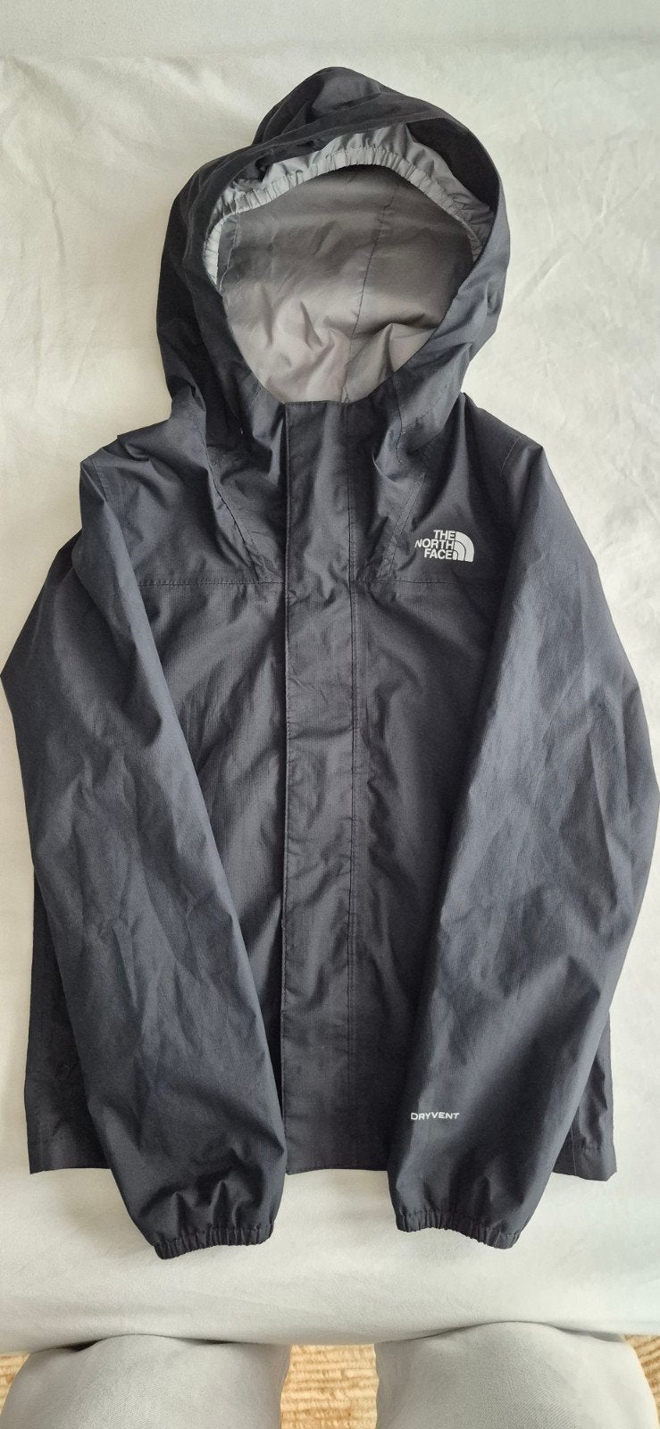 Zwart windjack/regenjas The Northface draagmaat 128-134, The North Face, Jongen of Meisje, Ophalen of Verzenden, Zo goed als nieuw