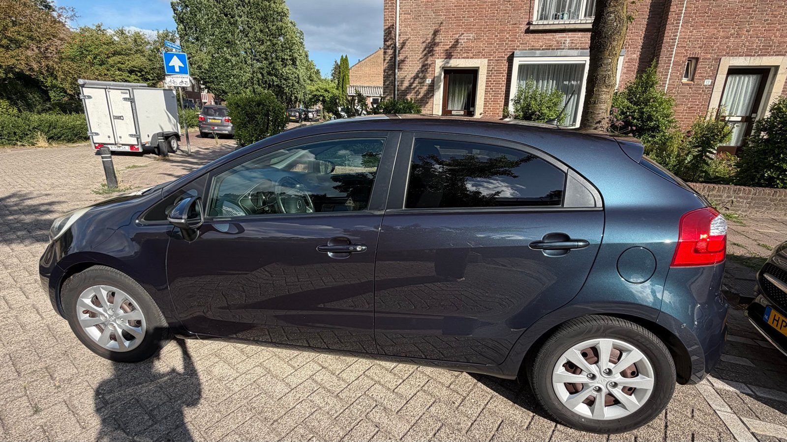 Kia Rio 1.2 CVVT | 2012 | 210.222 km | €2.000, 450 kg, 40 €/maand, 4 cilinders, Blauw