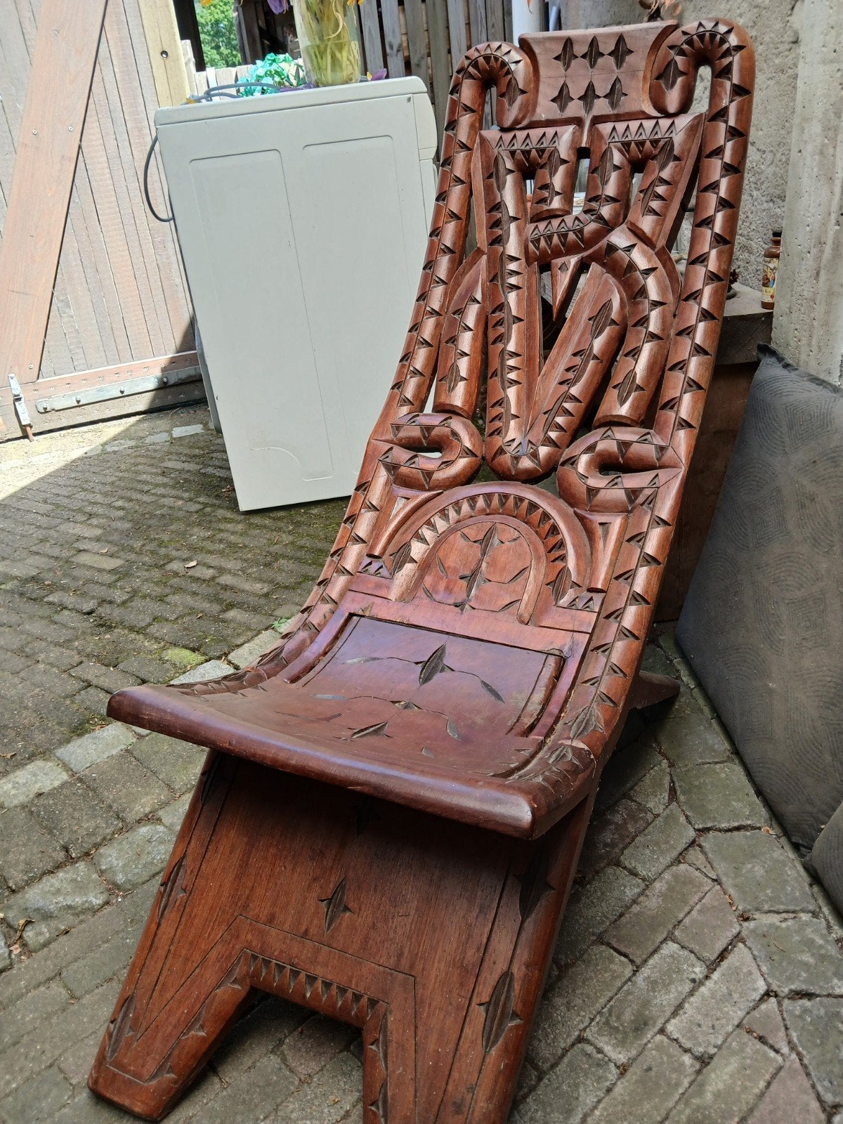 Afrikaanse stoel, Ophalen