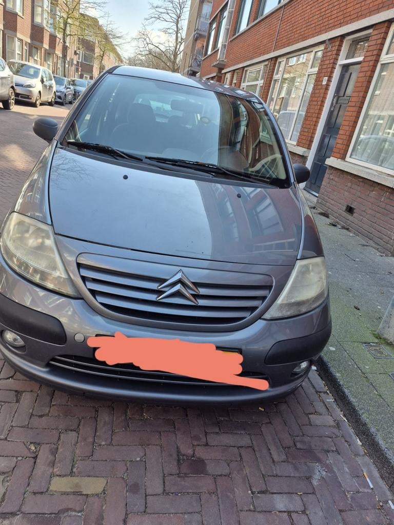 Citroën C3 1.4 I 2004 Grijs, Auto's, Citroën, Voorwielaandrijving, Leder en Stof, Origineel Nederlands, Handgeschakeld