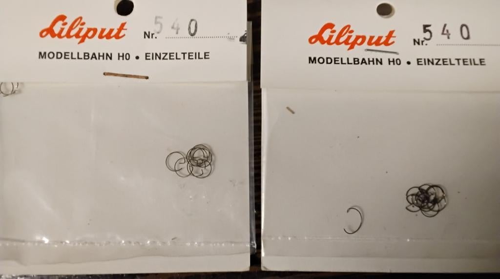 Liliput no 540 koppeling veerring 10 stuk in een zakje 6 eur, Hobby en Vrije tijd, Modeltreinen | H0, Gelijkstroom, Ophalen of Verzenden