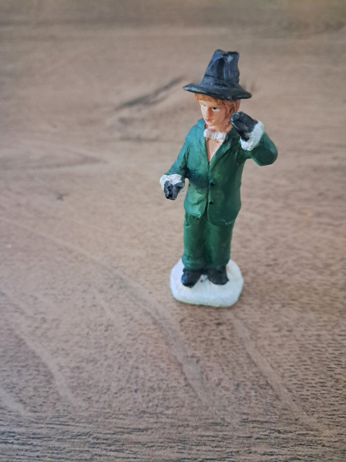 man met groene jas en hoge hoed, Diversen, Ophalen