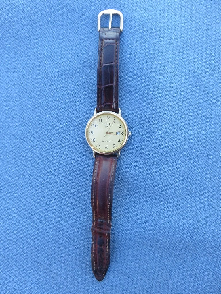 Horloge quartz met leren bandje – 2e de helft 20e eeuw, Ophalen of Verzenden