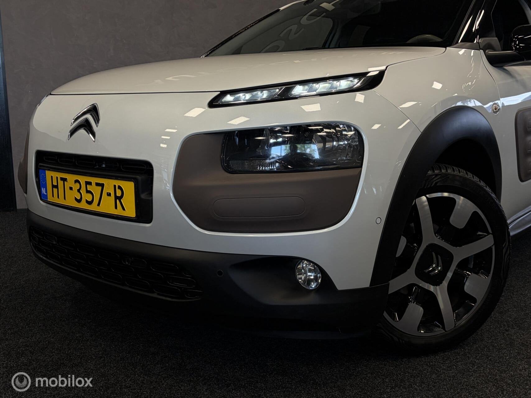 Citroen C4 Cactus 1.2 PureTech Shine NAVI / CLIMA / CRUISE /, Auto's, Voorwielaandrijving, Stof, Euro 6, 1199 cc