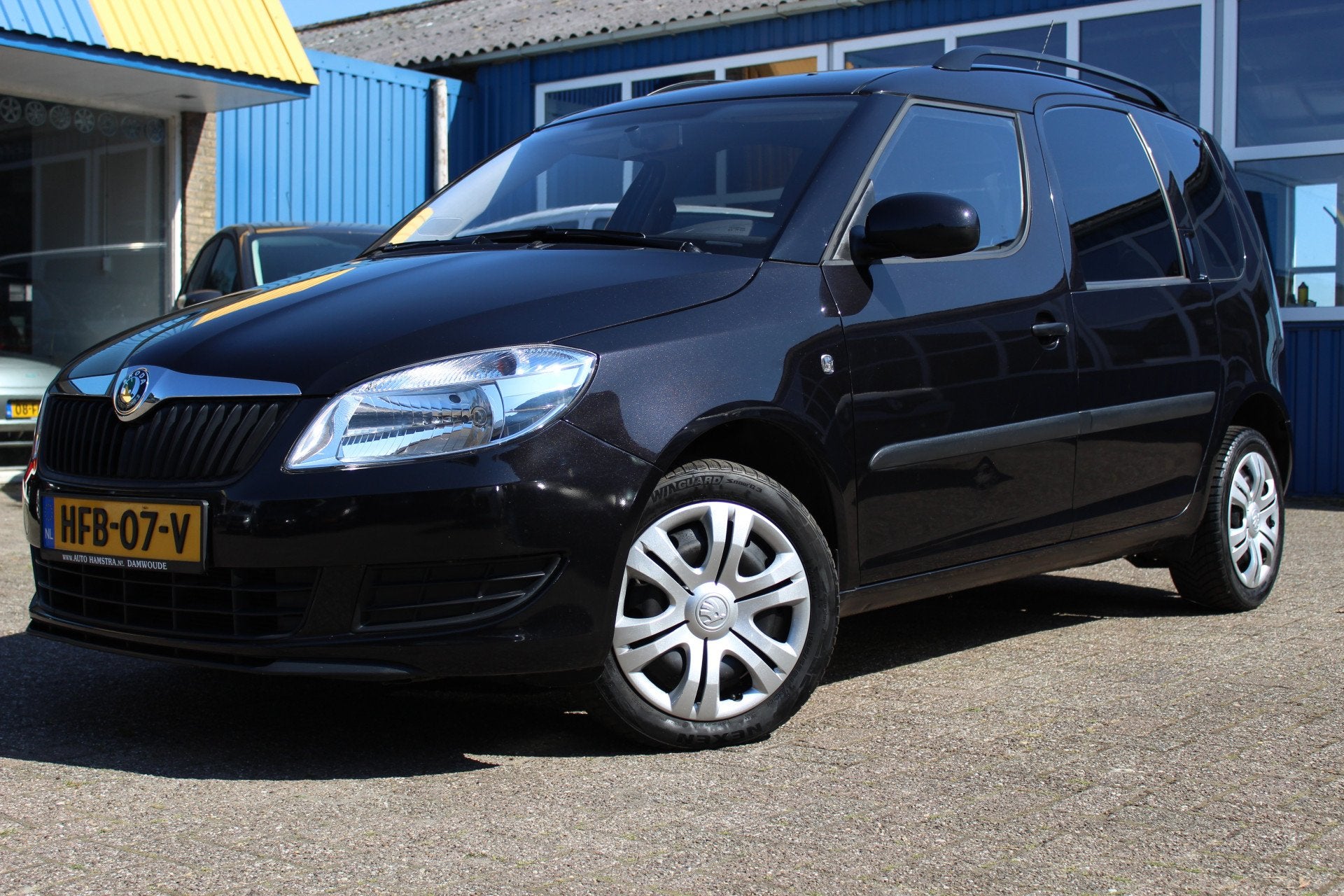 Skoda Roomster 1.2i "Plus Edition" Airco + AUX ! (bj 2011), Auto's, Voorwielaandrijving, Dealer onderhouden, Gebruikt, Zwart
