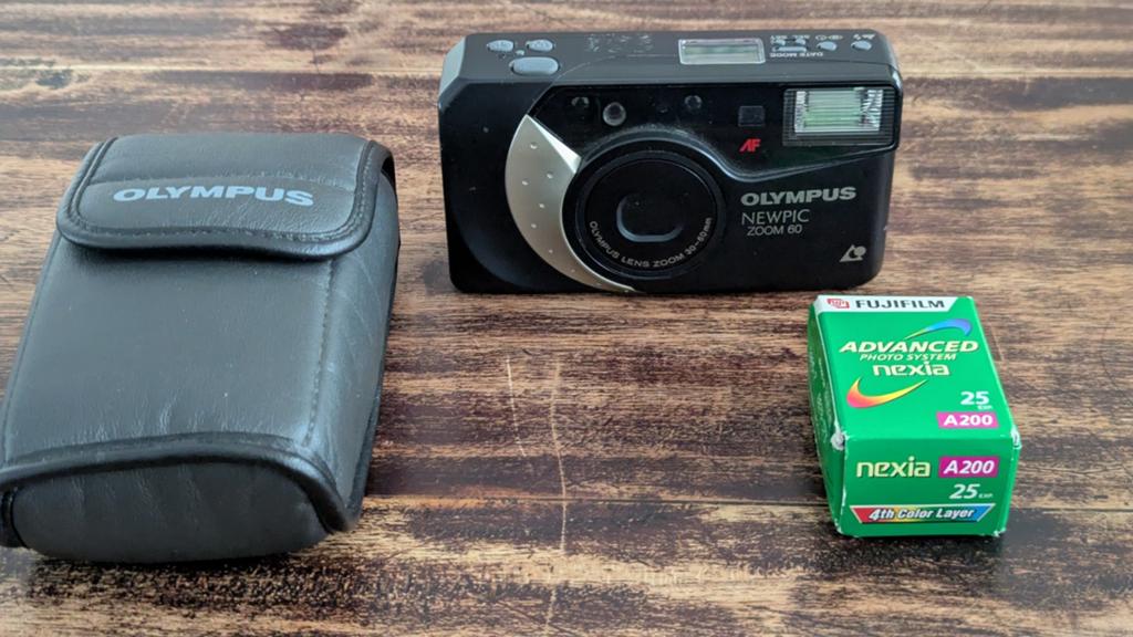 Olympus Newpic Zoom 60 APS Camera met tas en film, Audio, Tv en Foto, Fotocamera's Analoog, Ophalen, Gebruikt, Compact, Olympus