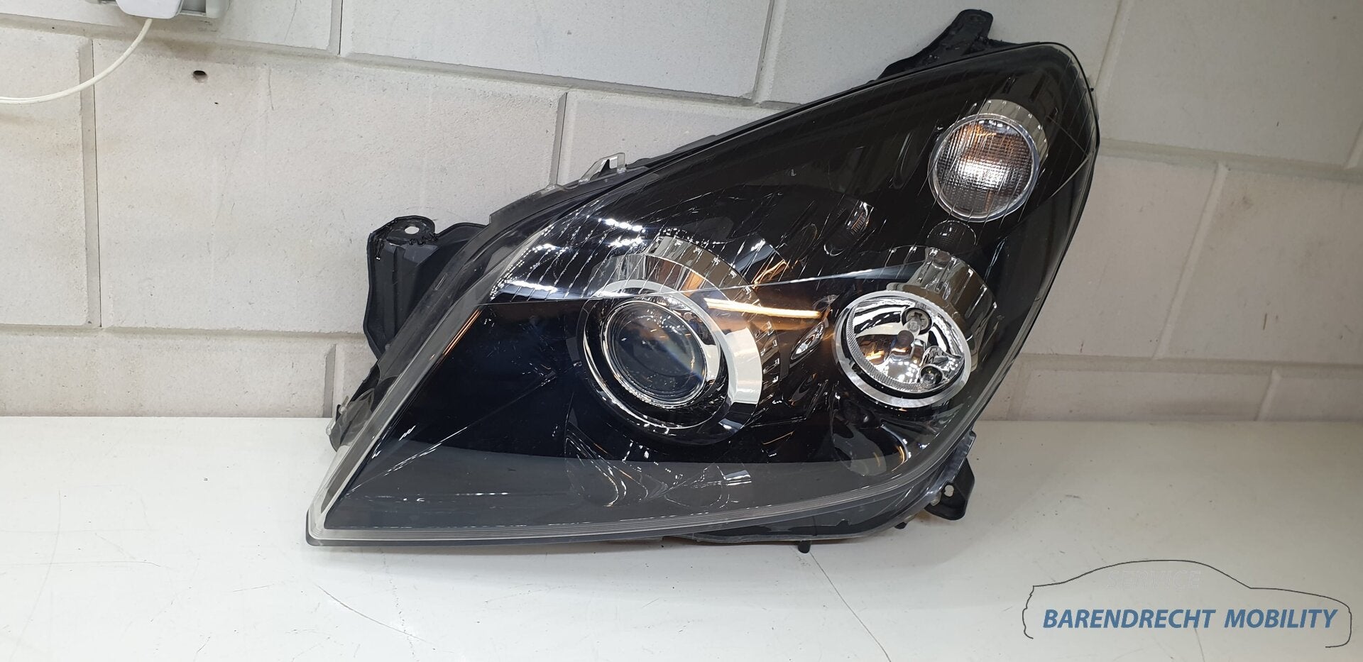 Xenon koplamp Opel Astra H 1EL008700-31 links bestuurderskan, Auto-onderdelen, Gebruikt, Opel Automobile GmbH, Ophalen of Verzenden