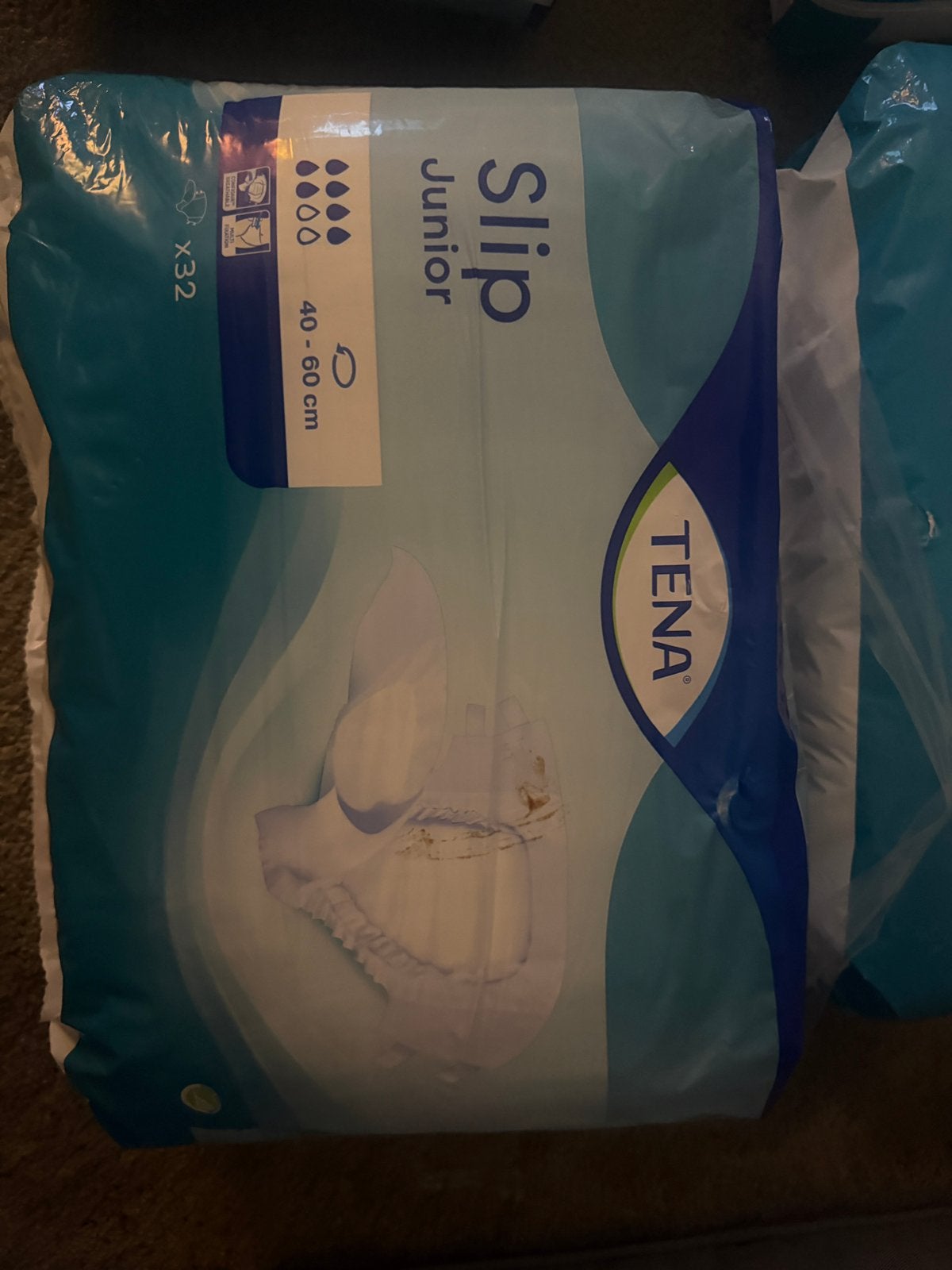 TENA Slip Junior luiers – 4 pakken te koop, Ophalen, Nieuw