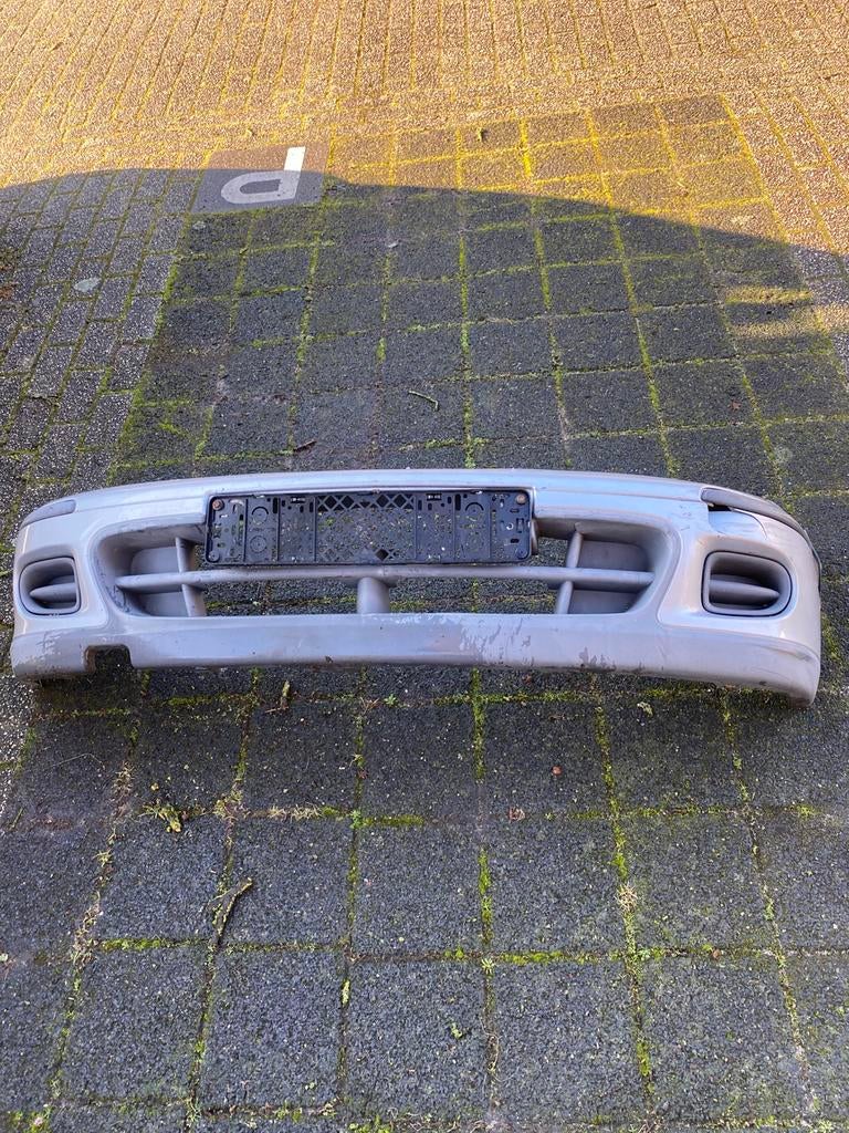 Nissan Micra voorbumper, Ophalen of Verzenden, Voor, Nissan, Bumper