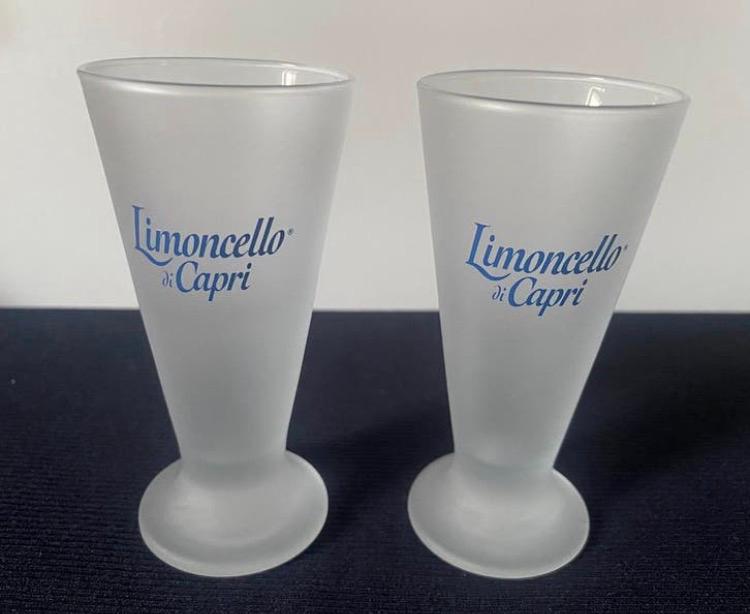 2 Limoncello di Capri glaasjes op voet. Hoogte 10 cm., Ophalen of Verzenden, Zo goed als nieuw, Borrel- of Shotglas