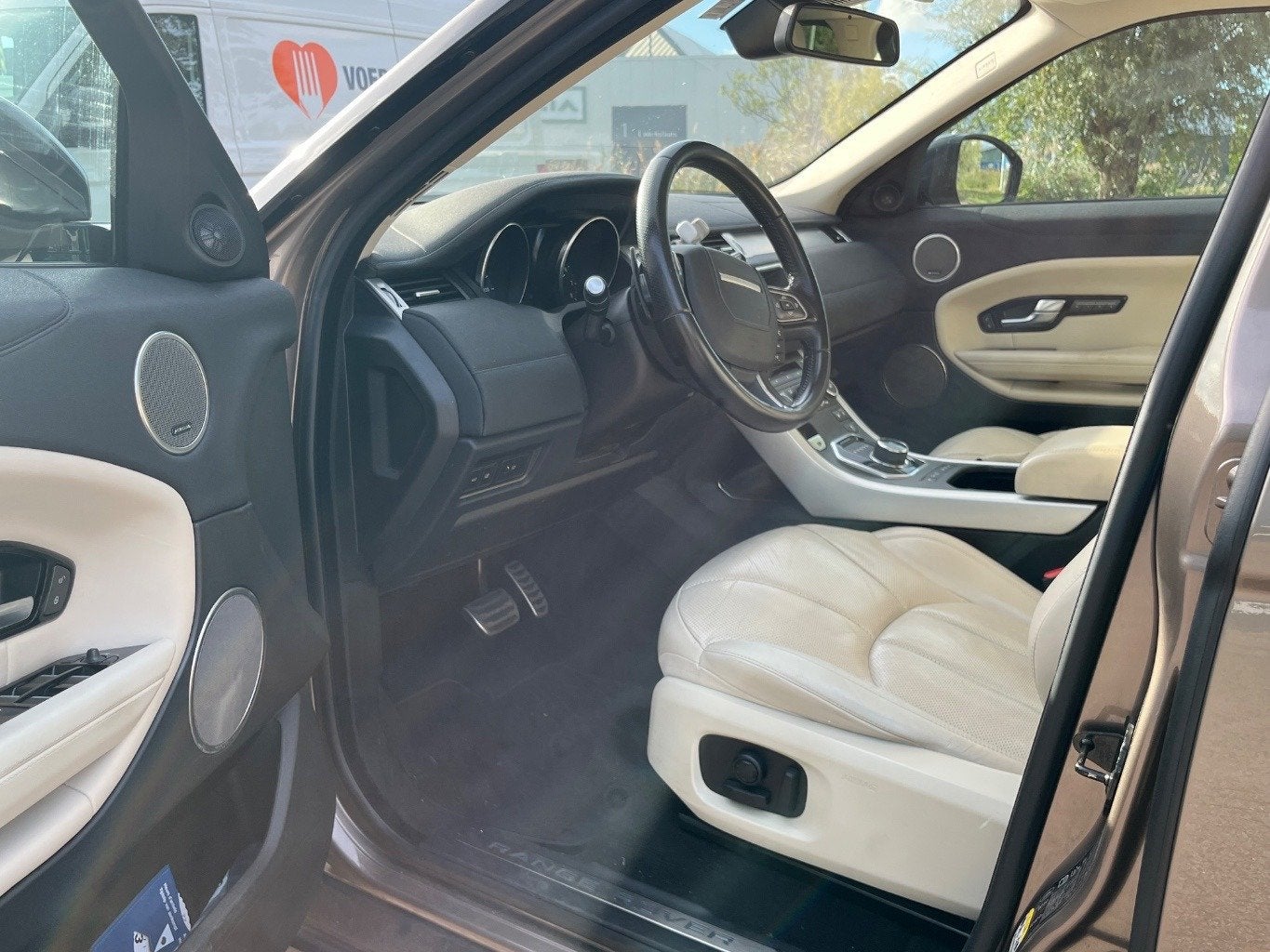 Land Rover Range Rover Evoque 2.0 Si4 Autobiography, Navi, C, Auto's, Dealer onderhouden, 4 cilinders, Bruin, Leder