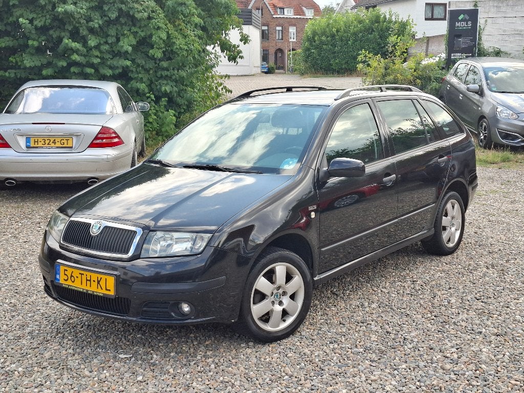 Skoda Fabia 1.4 Combi 74KW 2006 Zwart Airco NAP APK 2027, Auto's, Voorwielaandrijving, 4 cilinders, 100 pk, Origineel Nederlands