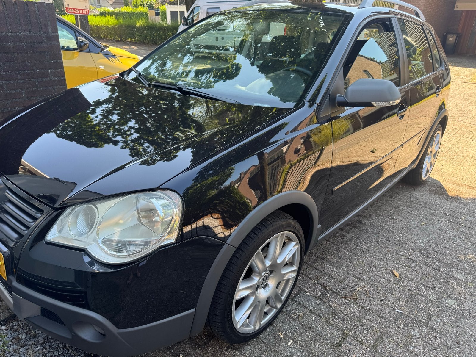 Volkswagen Polo 1.4 16V 59KW Cross 2009 Zwart, Voorwielaandrijving, 15 km/l, Zwart, Origineel Nederlands