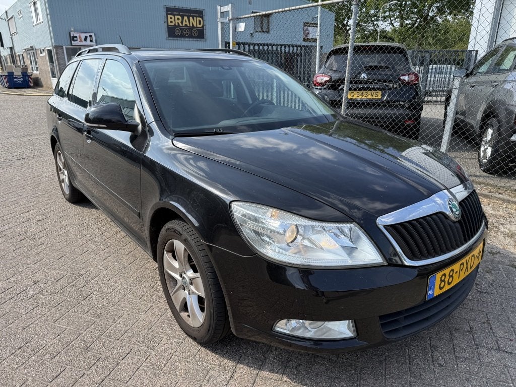 Skoda Octavia Combi 1.2 TSI Ambition Bns/ Inruilkoopje/Navi/, Auto's, Euro 5, Gebruikt, 4 cilinders, Zwart